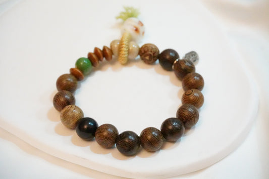 Wooden Bracelet with Ceramic Cuttie